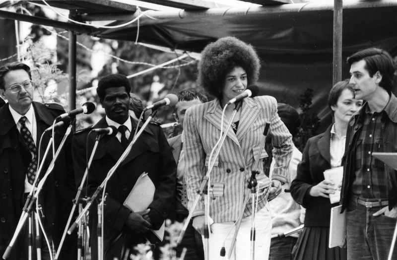American civil rights activist Angela Davis (centre) making an address at the 19th Evangelical Church Day at Hamburg, West Germany. Disarmament is a central issue at the conference.